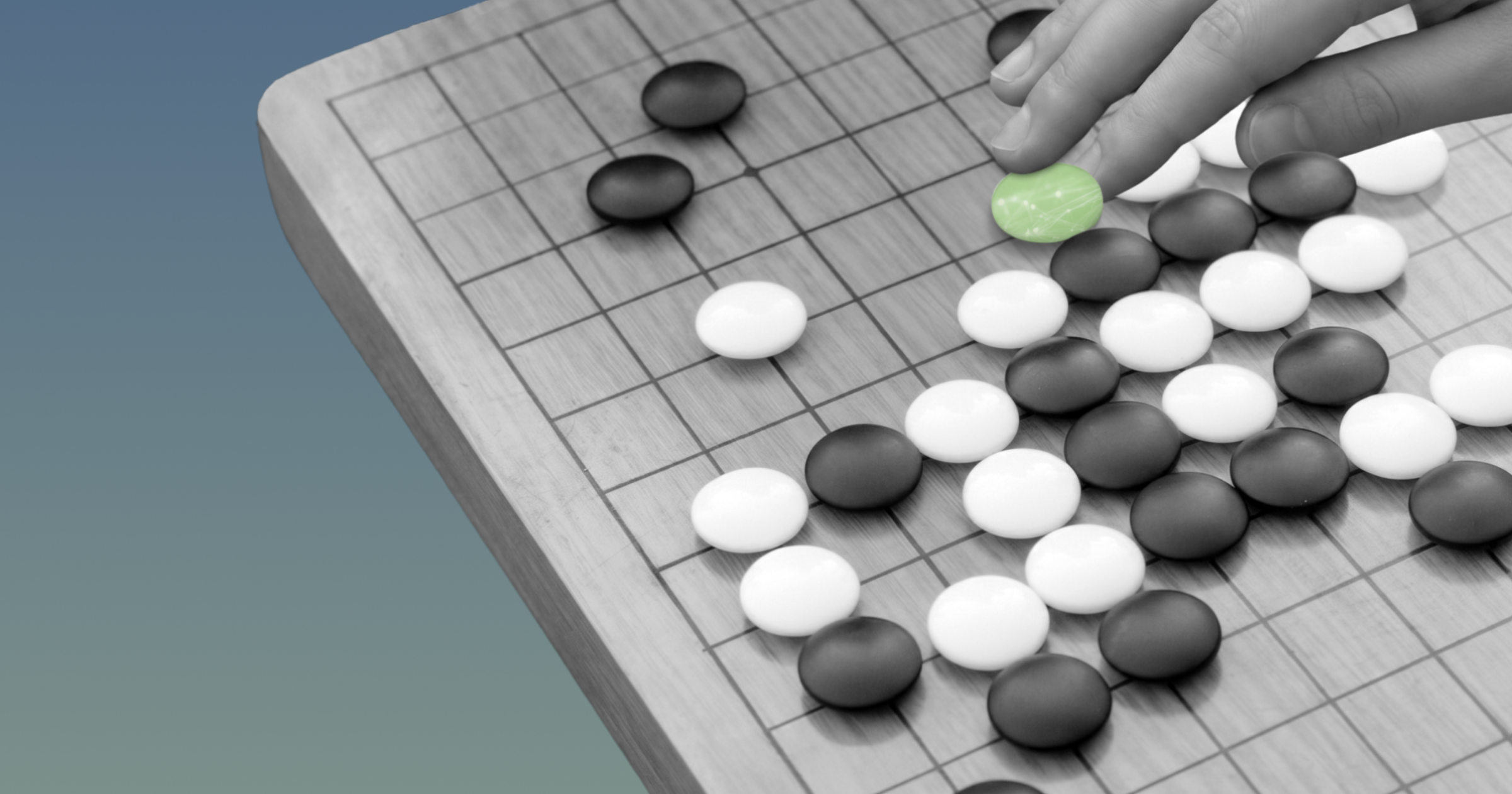 A game of Go in progress, with black and white stones on a wooden board